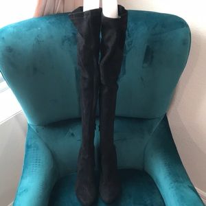 Thigh high black suede boots